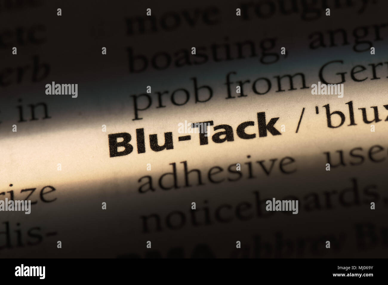 blutack word in a dictionary. blutack concept Stock Photo Alamy