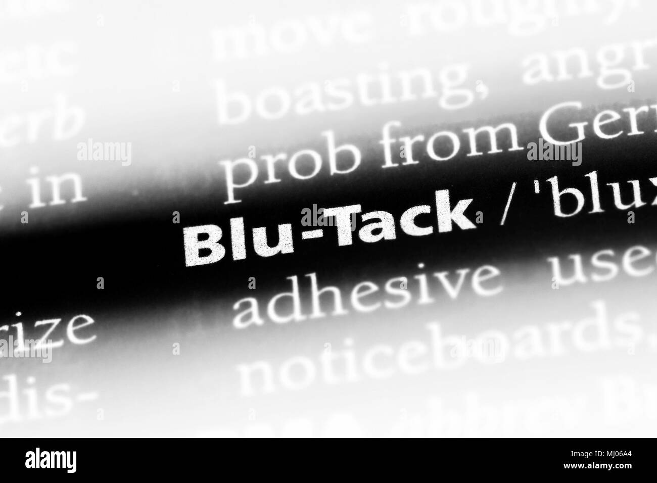 blutack word in a dictionary. blutack concept Stock Photo Alamy