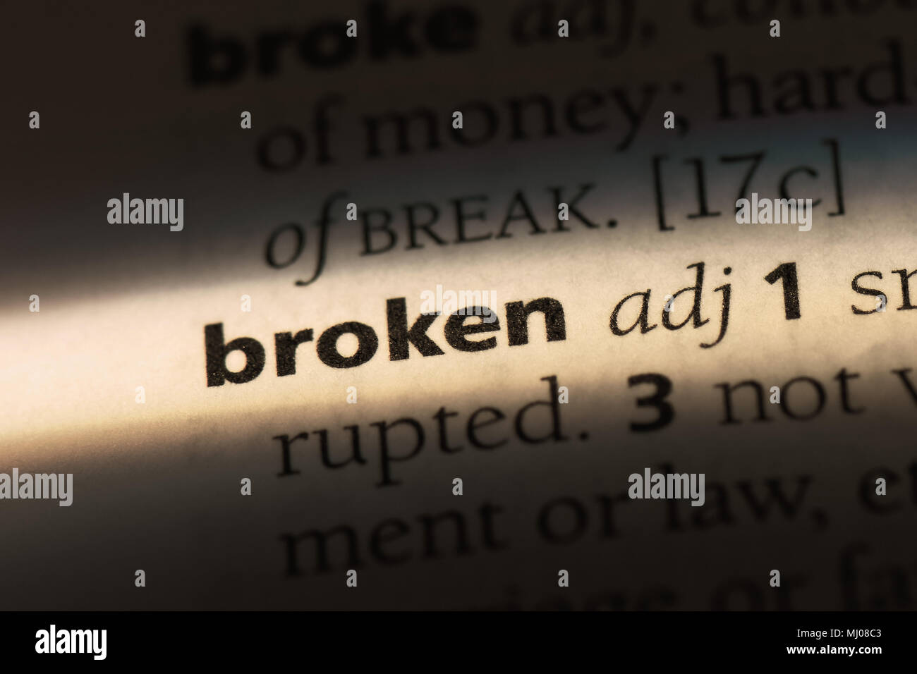 broken word in a dictionary. broken concept Stock Photo Alamy