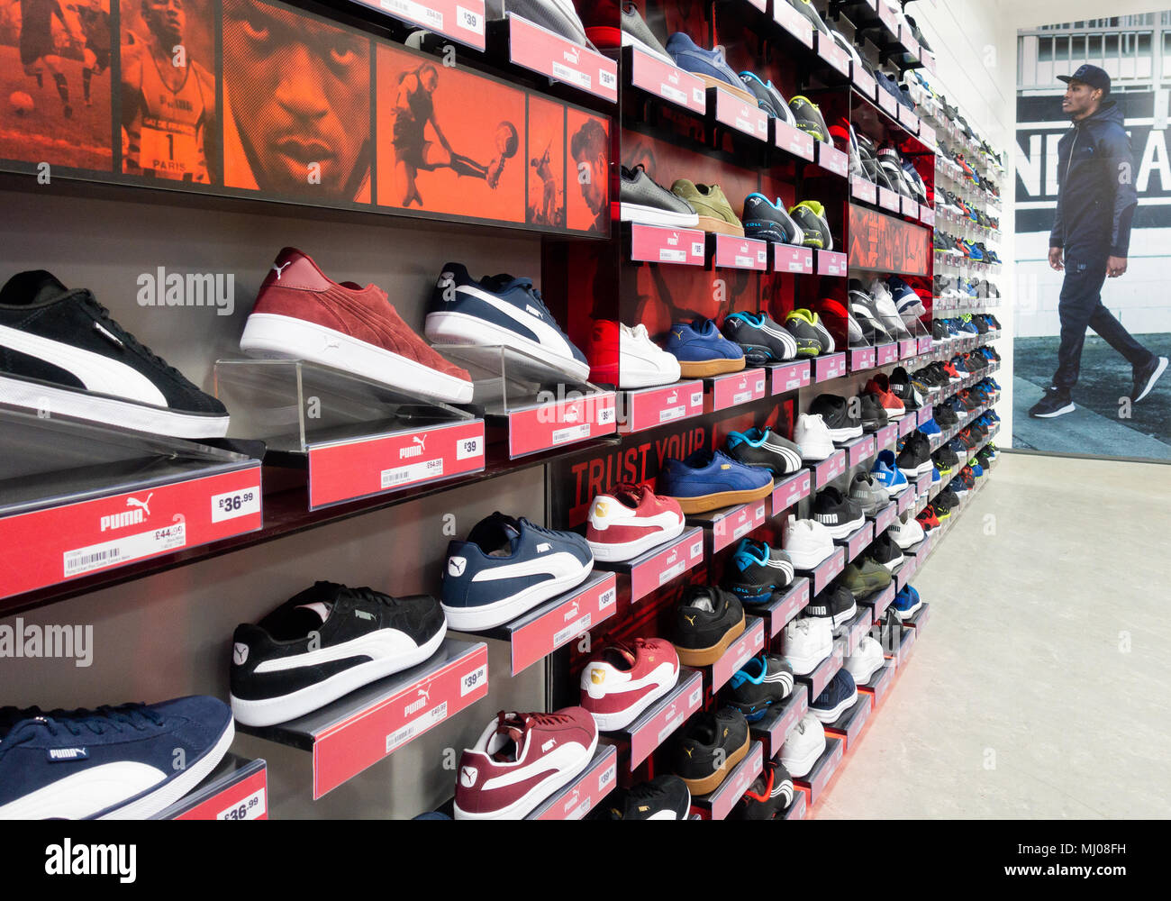 Puma training shoes in Sports Direct store. UK Stock Photo - Alamy