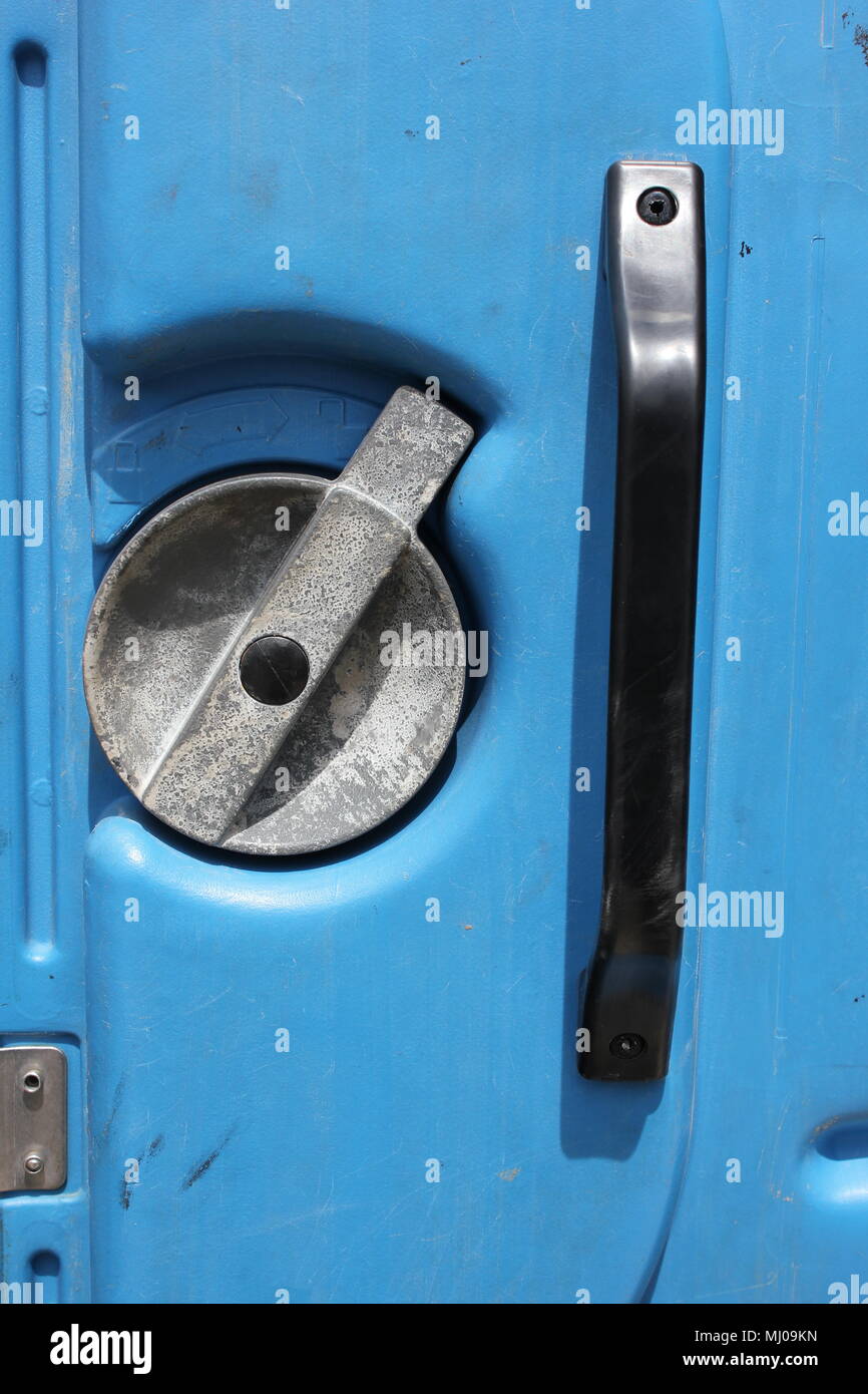 Inside view of the handle and latch for a port a potty Stock Photo Alamy