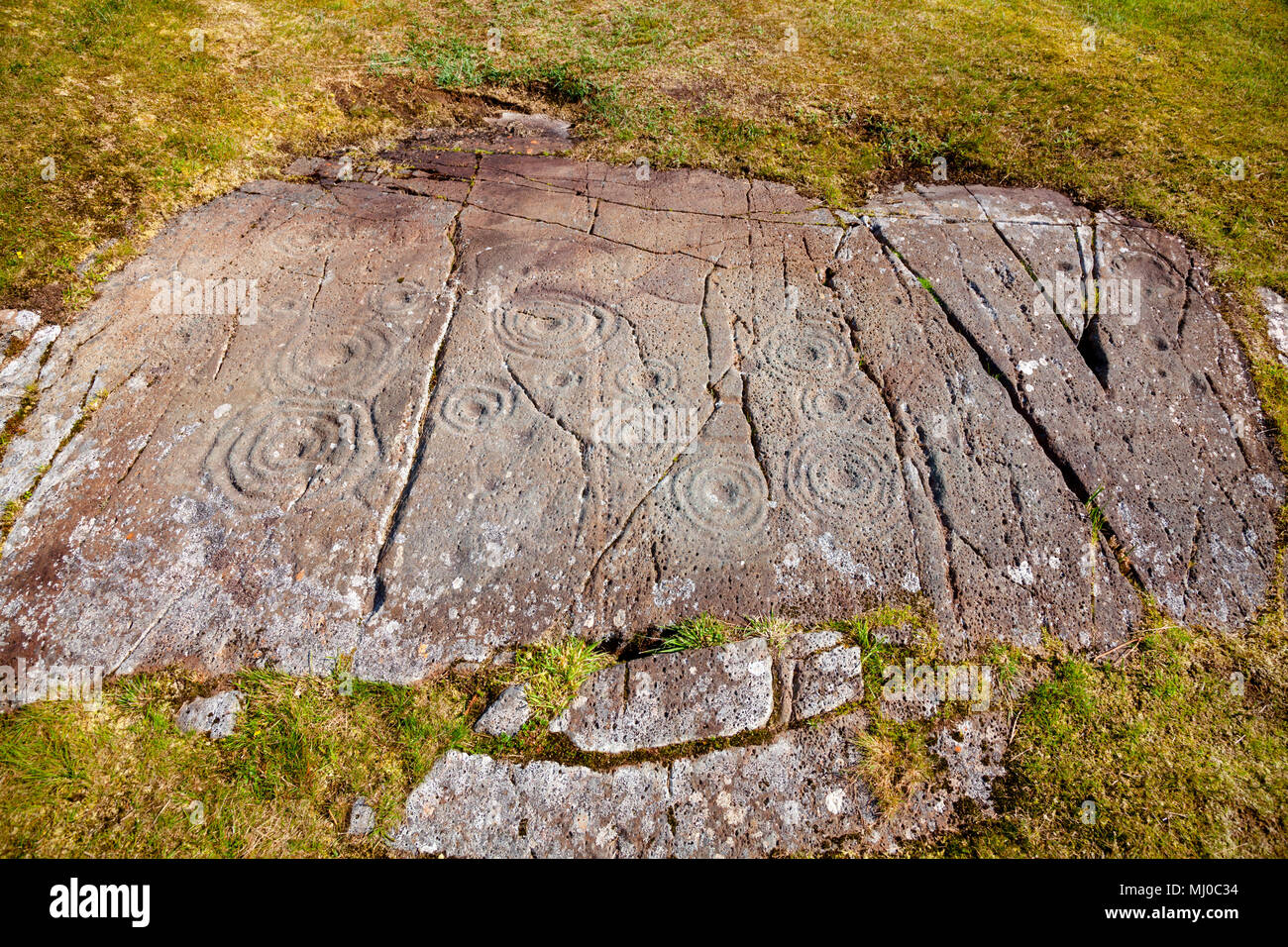 Cup and rings marks on a stone dating from the Iron Age at Cairnbaan prehistoric site, Argyll and Bute, Scotland, UK Stock Photo