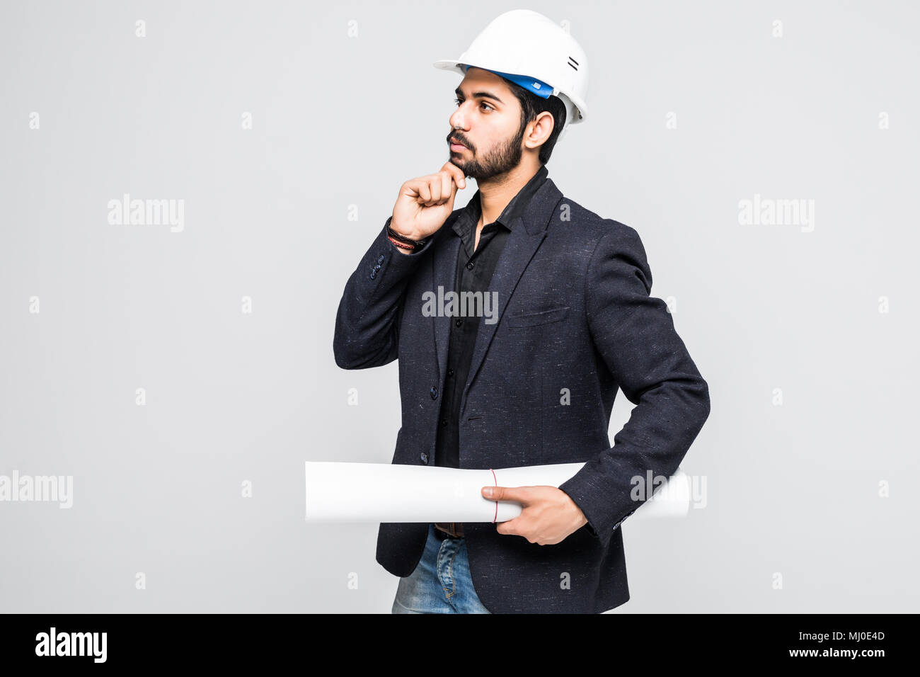 Indian Architect holding blueprints isolated on white Stock Photo