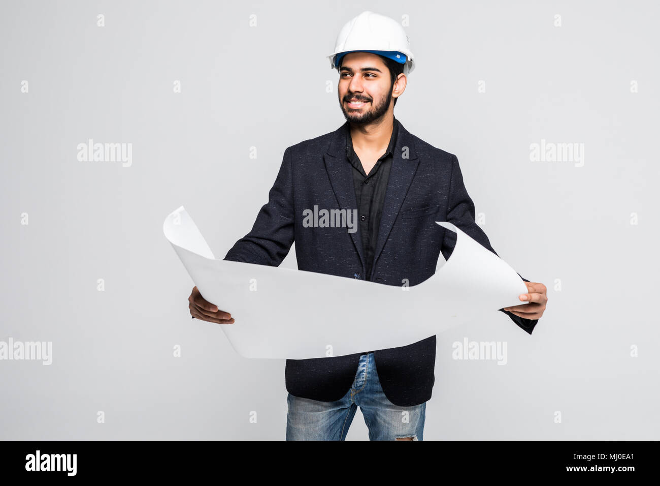 Indian Architect holding blueprints isolated on white Stock Photo