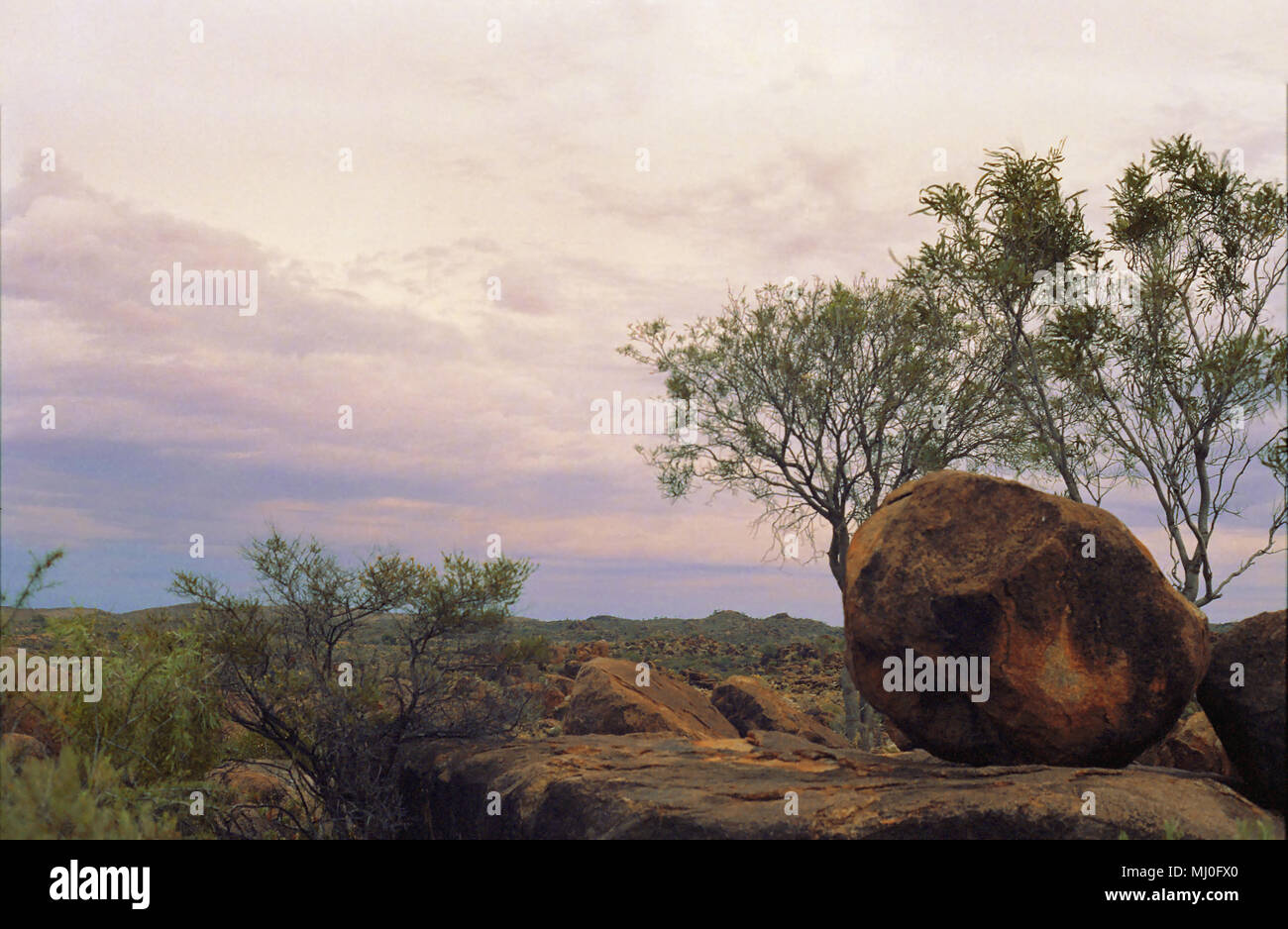 Characteristic granite tor near Tibooburra in the outback with evening sky behind: Corner Country, New South Wales, Australia Stock Photo