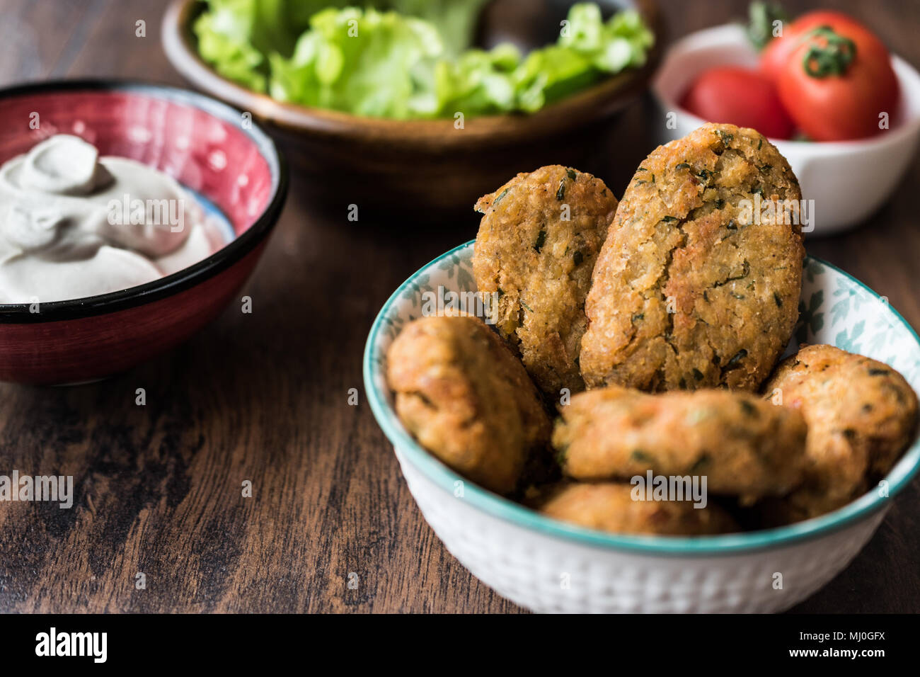 Falafel is a deepfried ball or patty made from ground chickpeas, fava