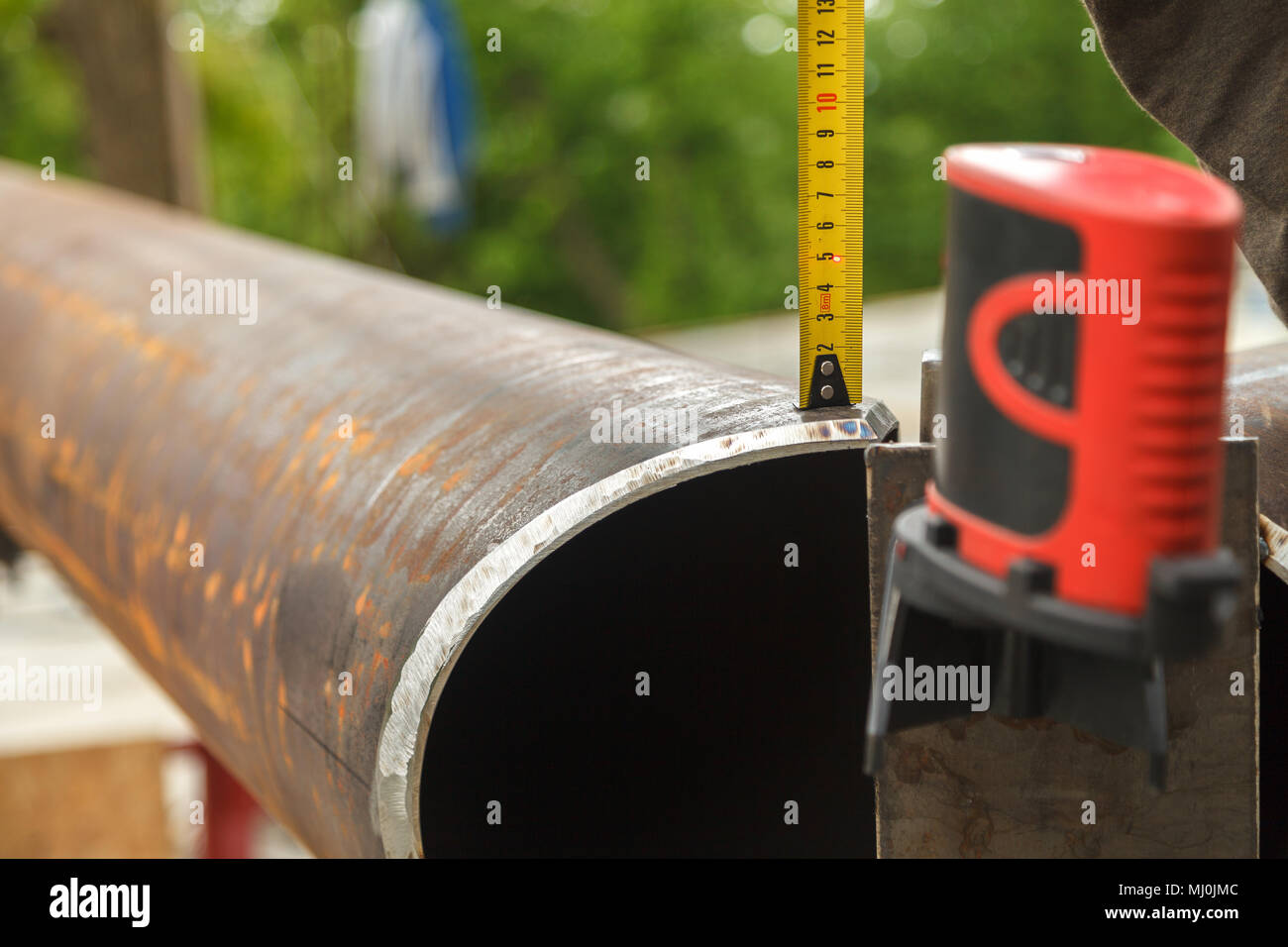 Checking the accuracy of the measurement with the laser level Stock