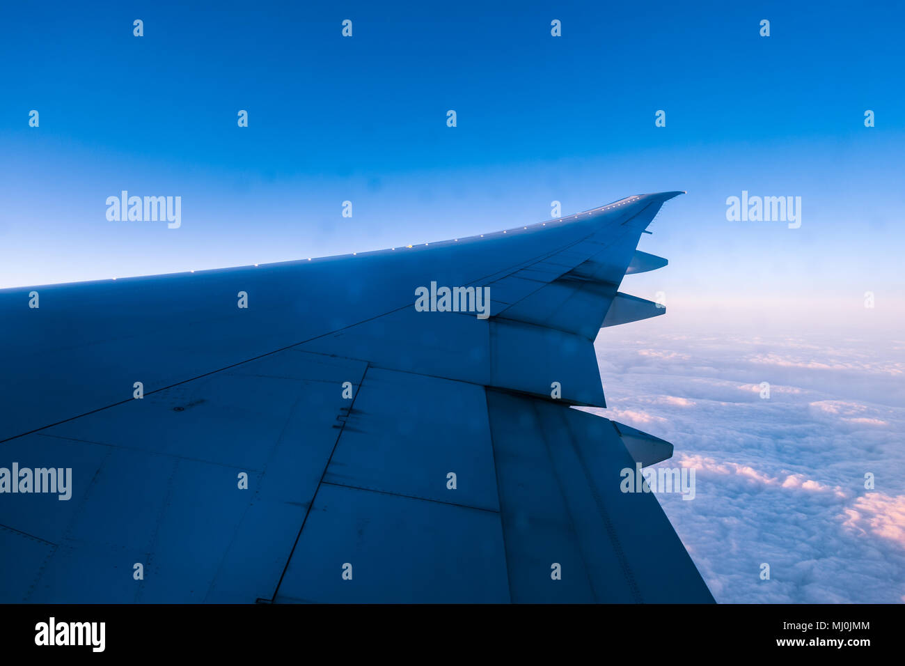 Aircraft wing with aileron flaps hi-res stock photography and images ...