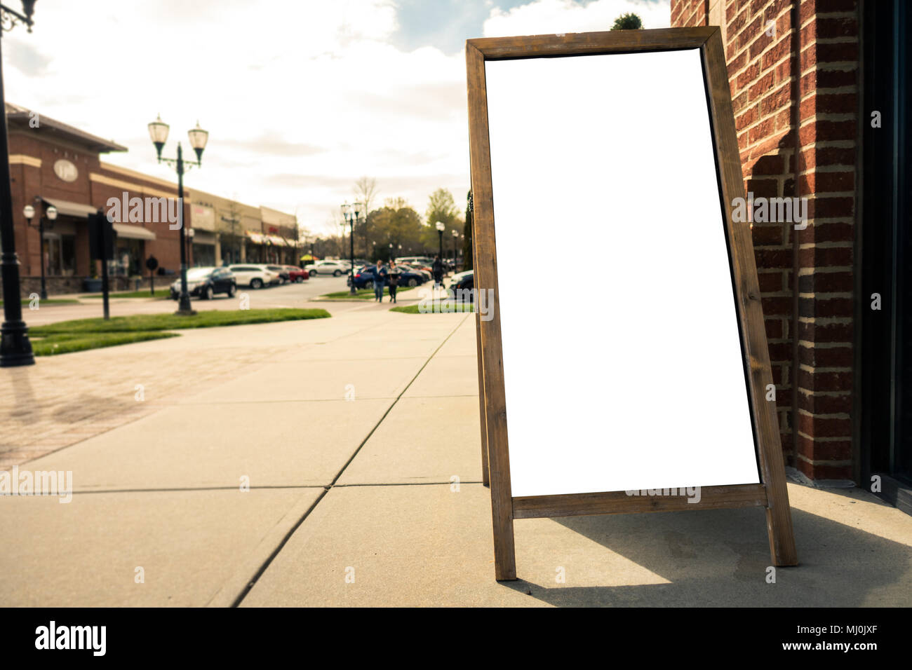 Billboard Rectangular White Mockup City Advertisement front a Store Stock Photo