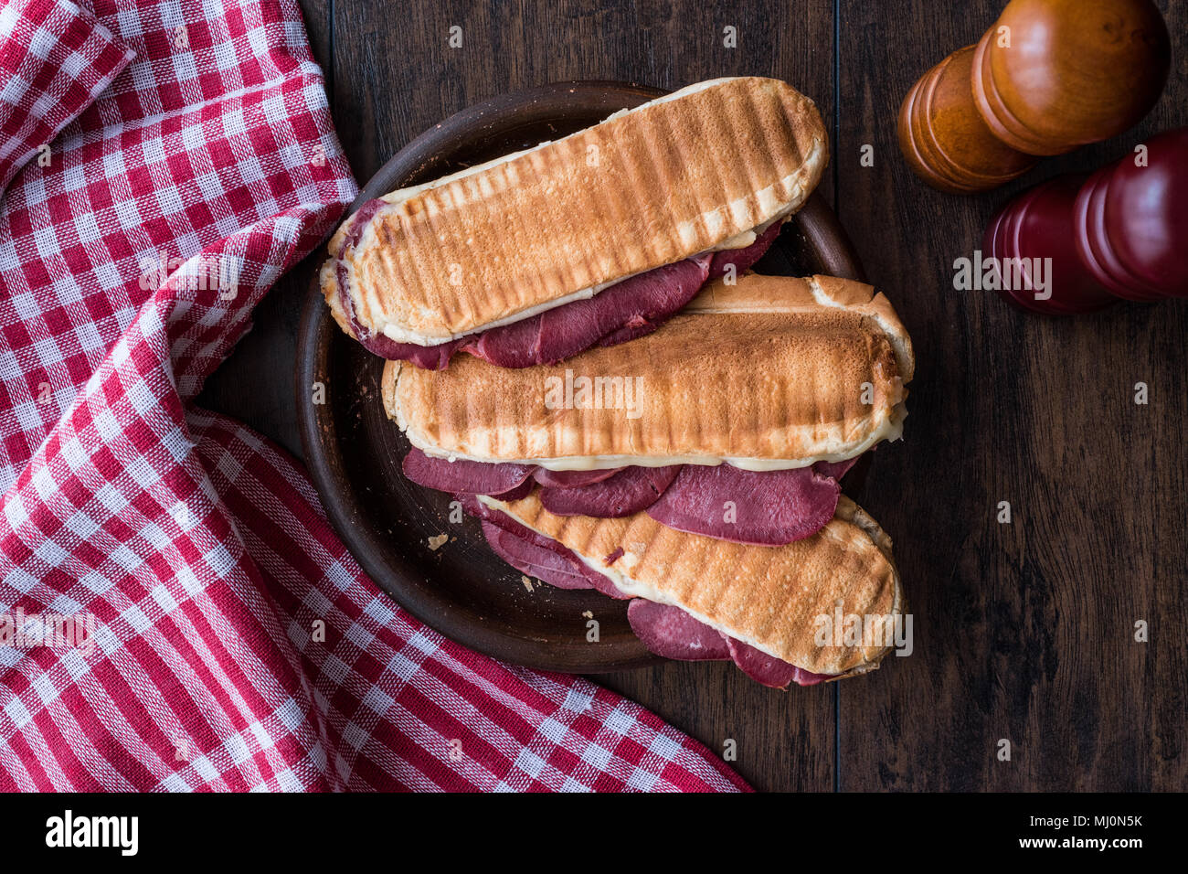 Dilli Kasarli   Beef Tongue Sandwich On A Wooden Surface Stock Photo 