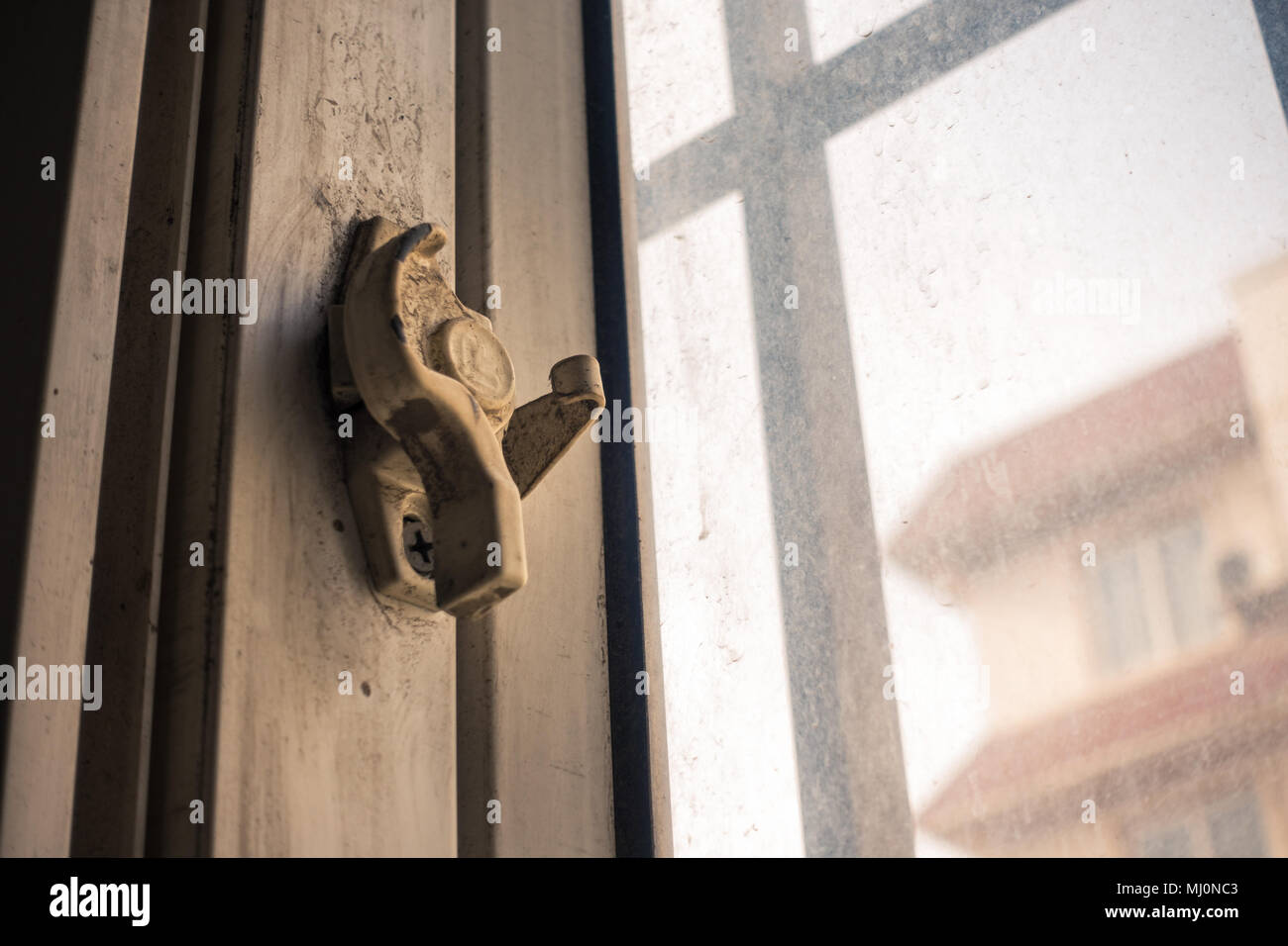 Window Sash Lock of a Chinese Apartment Stock Photo