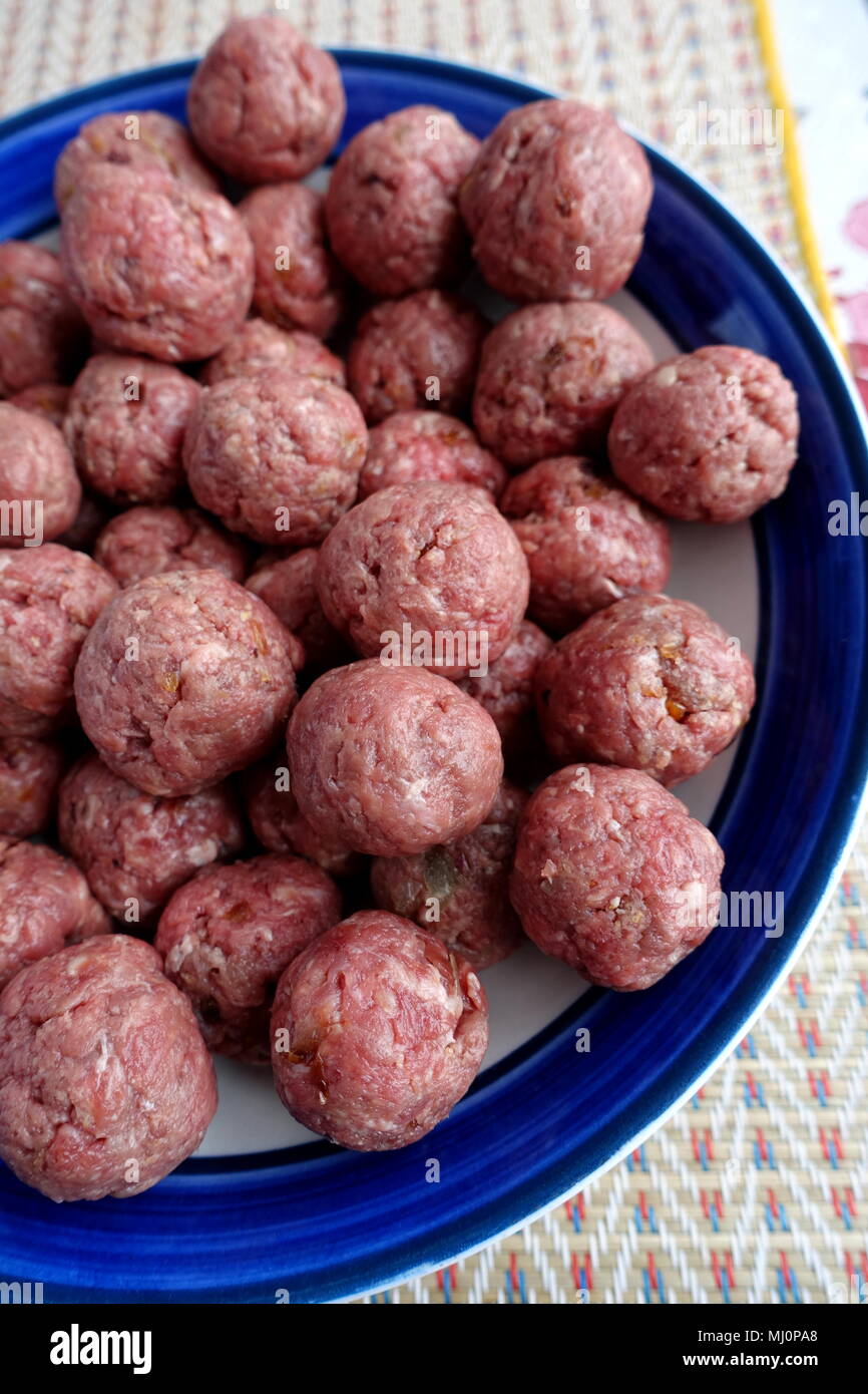 Close up of raw meat balls ready to cook Stock Photo