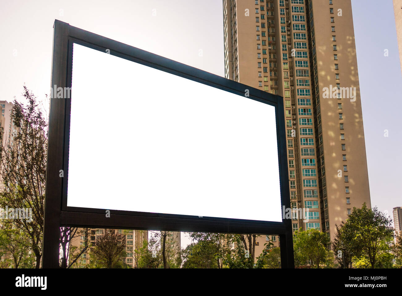 Billboard on the Street Rectangular White Mockup City Advertisement Stock Photo
