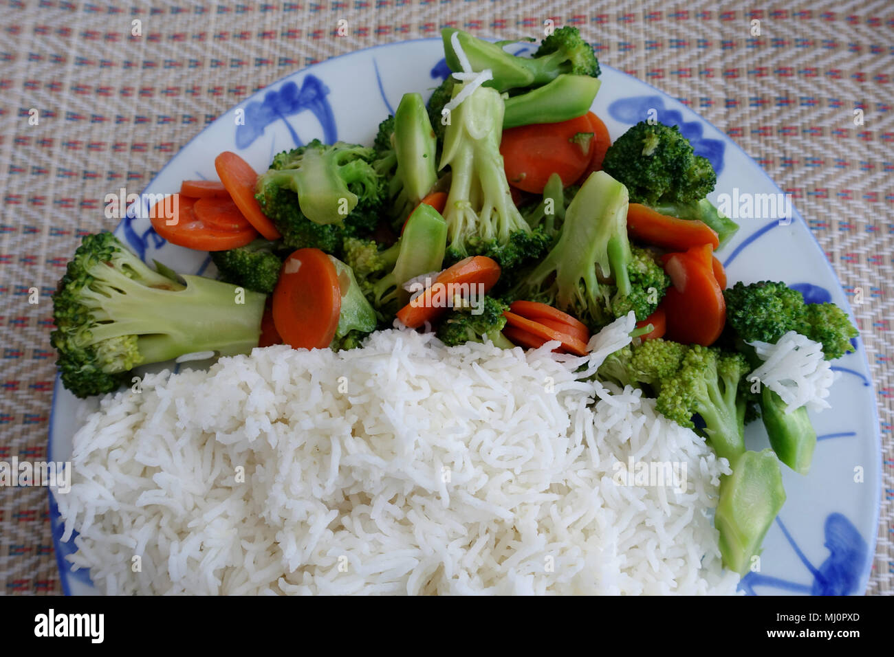 Rice and stir fry broccoli and carrot Stock Photo Alamy