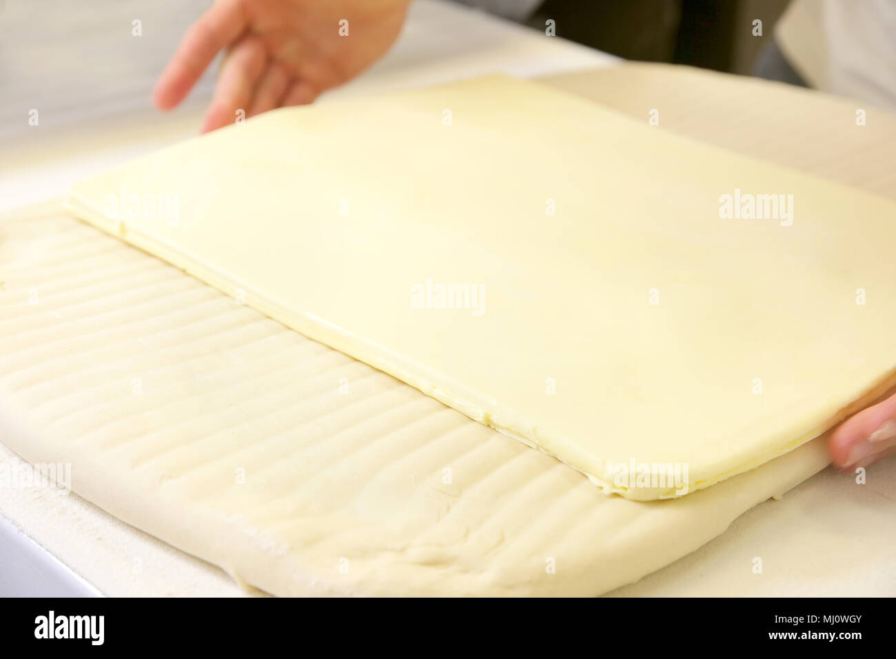 Making dough by male hands at bakery Stock Photo - Alamy