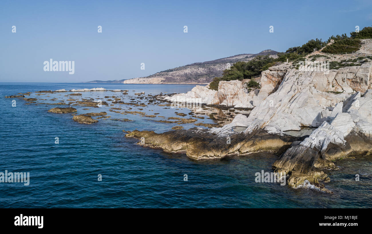Aegean seashore and marble rocks in Aliki, Thassos island, Greece Stock ...