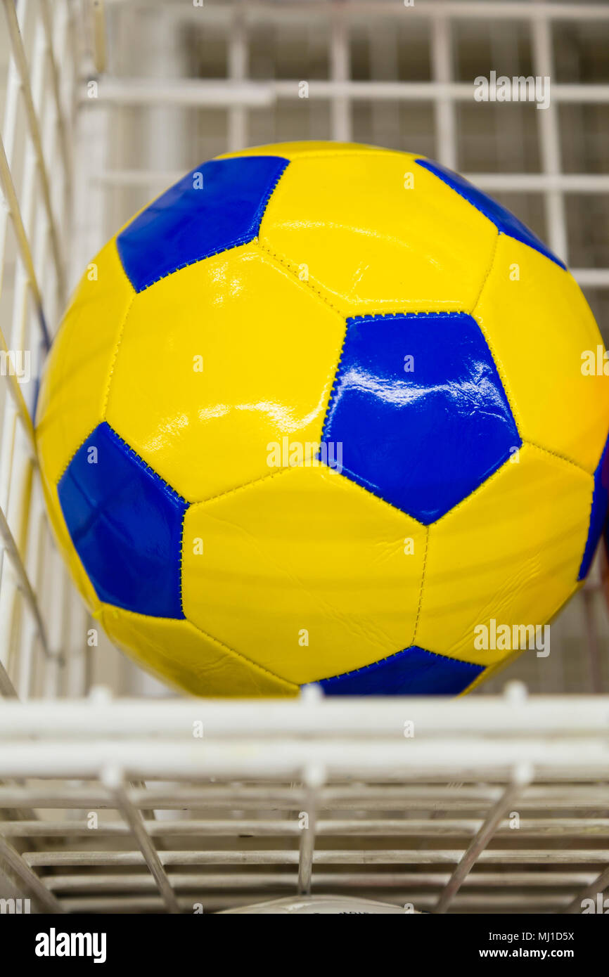 Colored soccer balls in the supermarket on sale Stock Photo Alamy