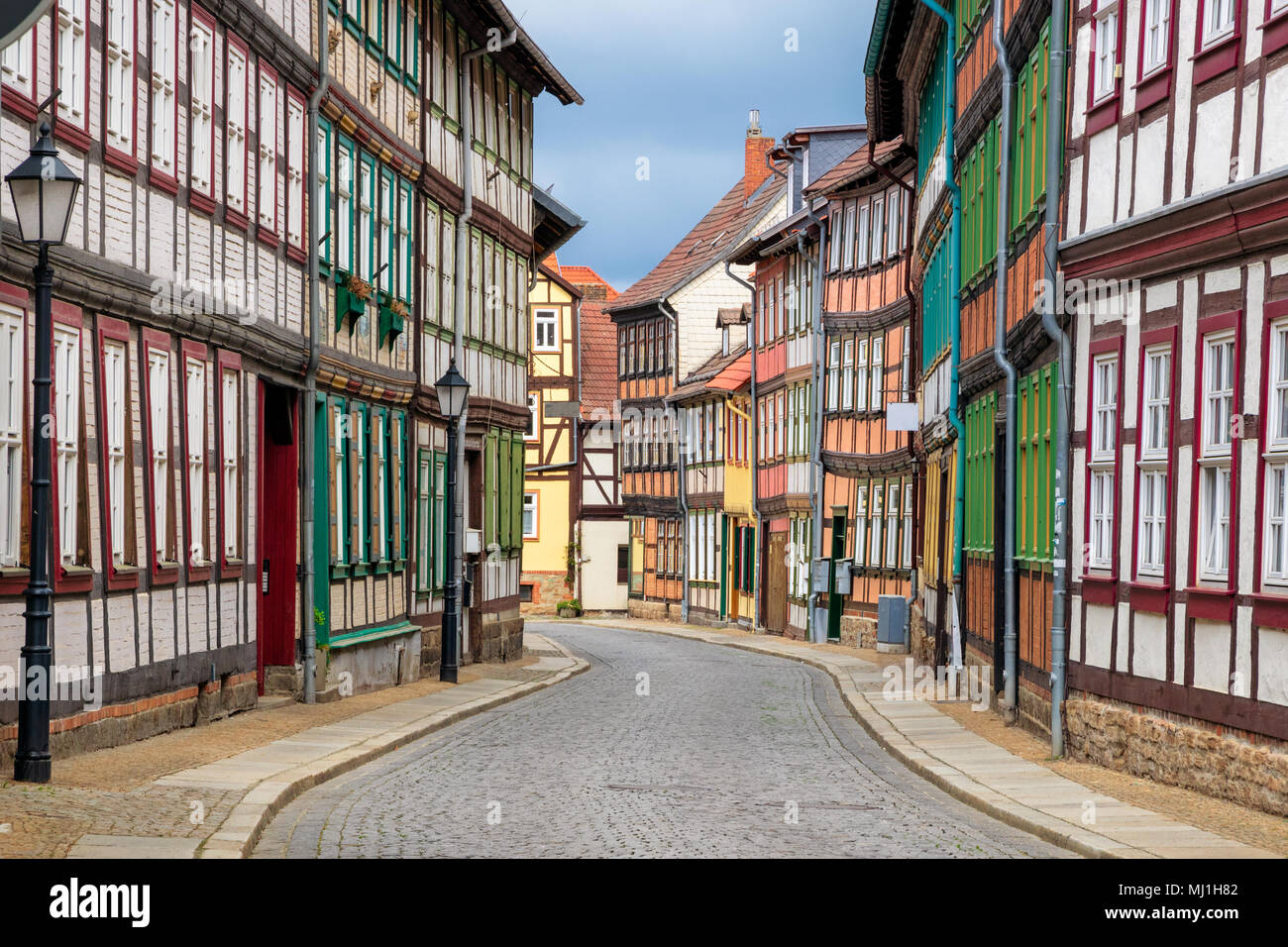 Street with historic timber framed houses in the centre of Wernigerode town in Saxony-Anhalt, Germany Stock Photo