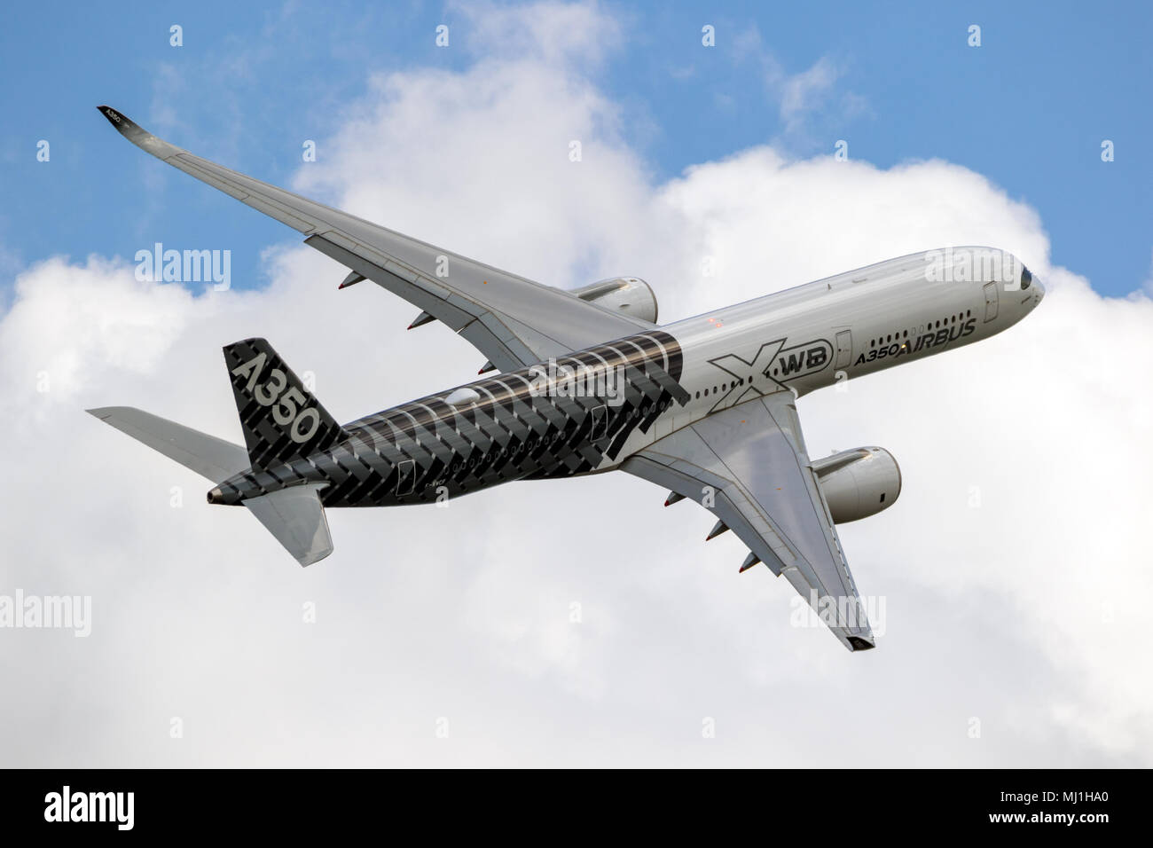BERLIN - APR 27, 2018: New Airbus A350 XWB passenger plane performing at the Berlin ILA Air Show. Stock Photo