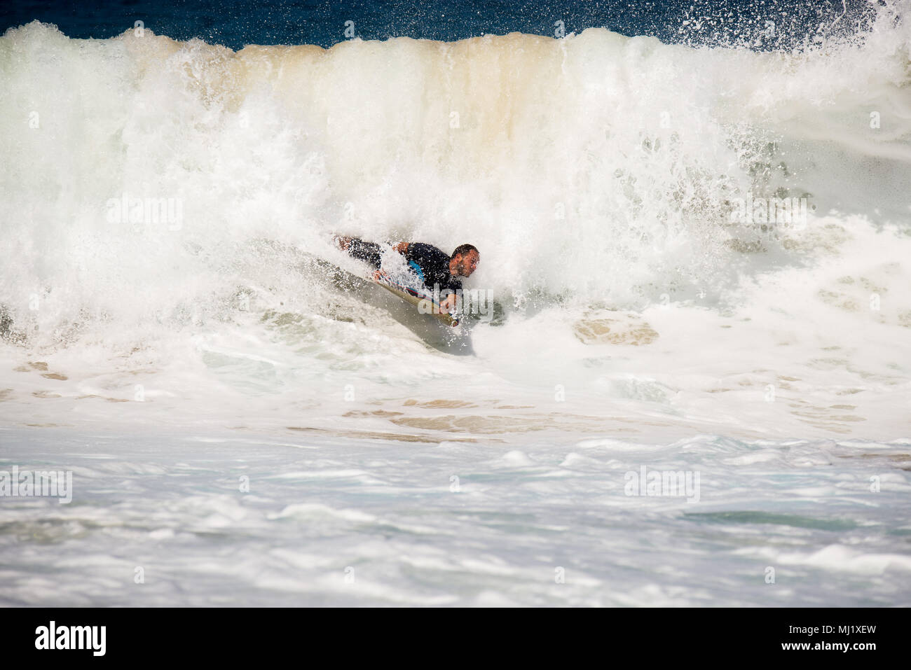 Big wave surfers hi-res stock photography and images - Alamy