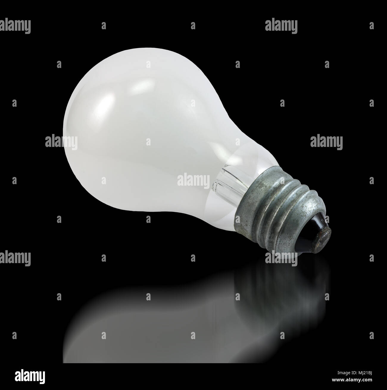 Incandescent bulb on black Stock Photo