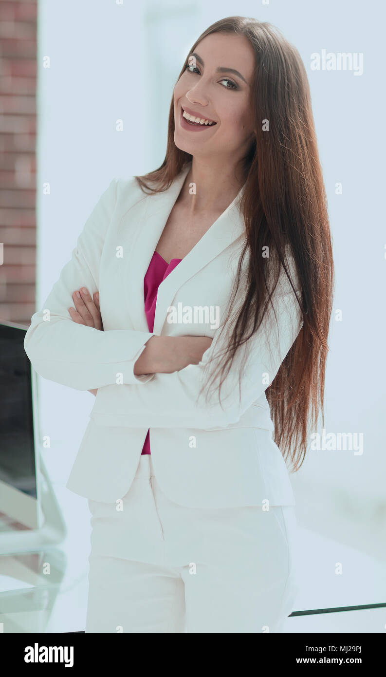 elegant business woman in a white business suit Stock Photo - Alamy