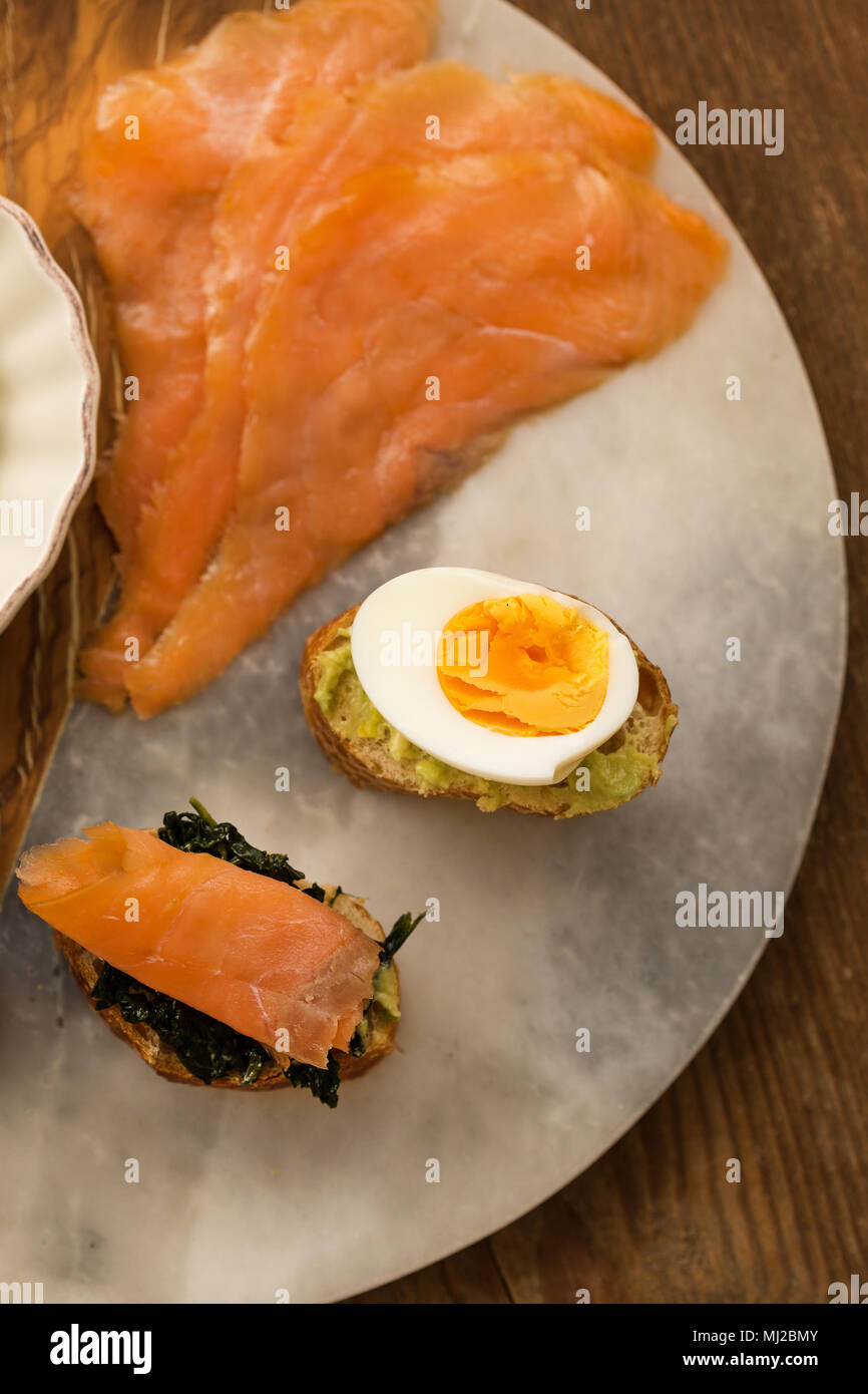 Smoked salmon egg spinach tomato hires stock photography and images