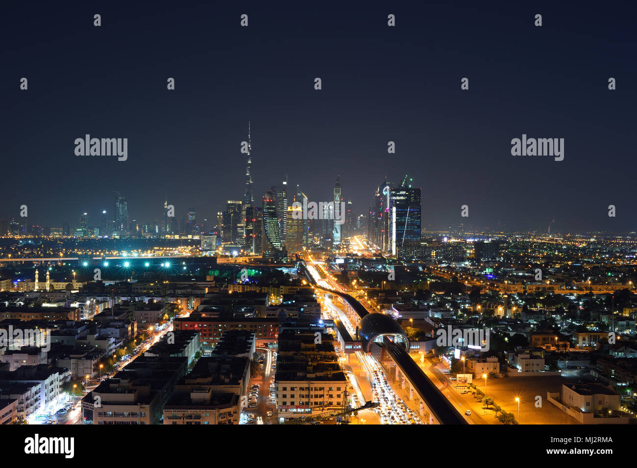 Dubai city buildings at night Stock Photo