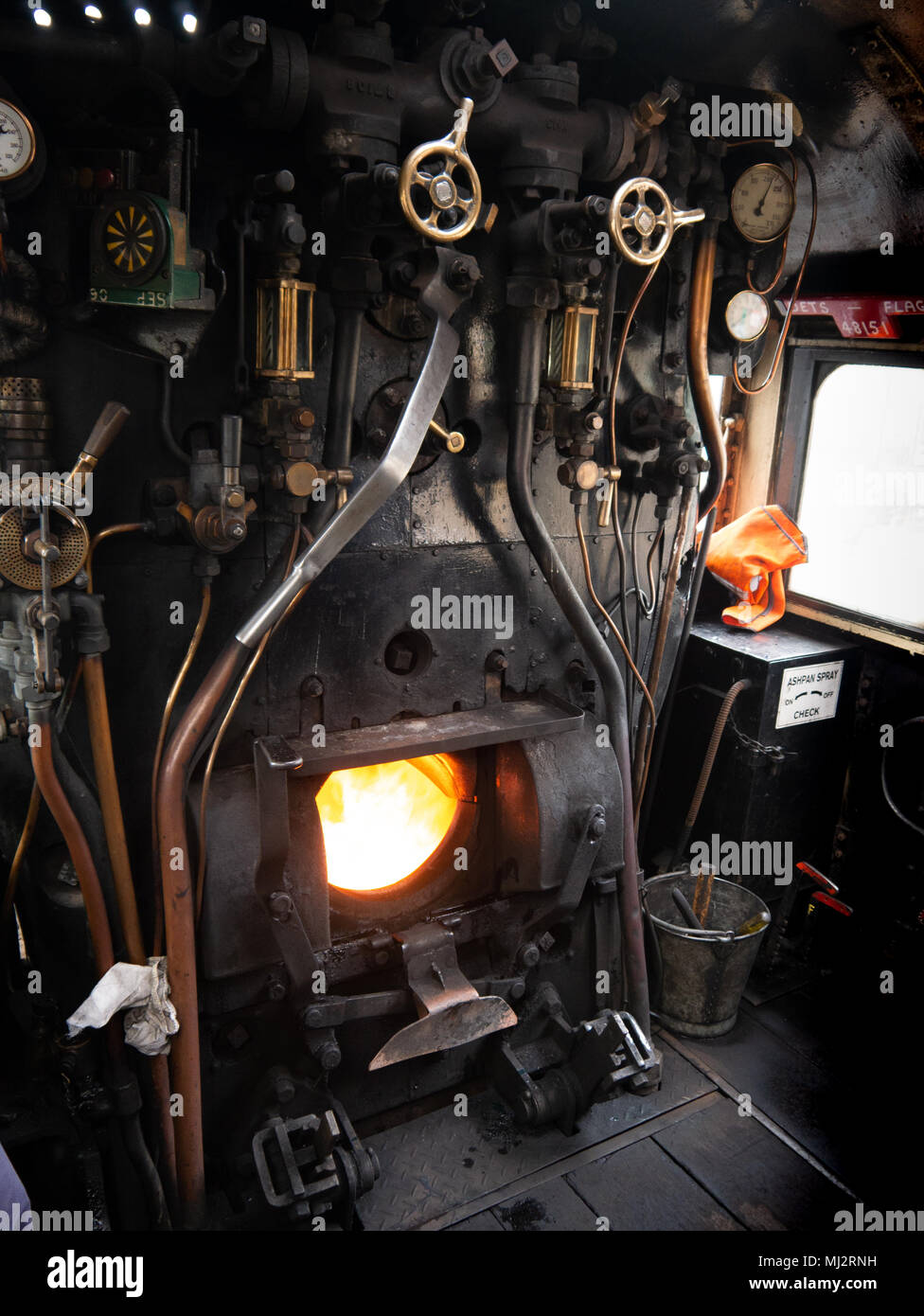 Firebox (furnace) in the cab footplate of the steam train, The Dalesman, 48151, Carnforth to Carlisle West Coast line Stock Photo