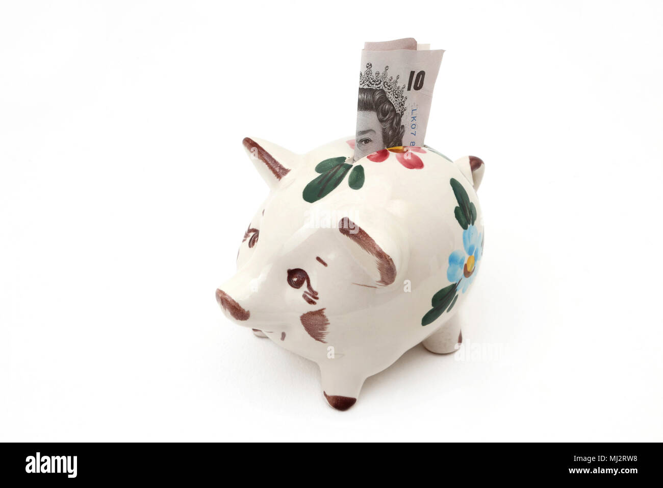 Piggy Bank Money Box with Old Ten Pound Note out of Circulation in 2017 Stock Photo