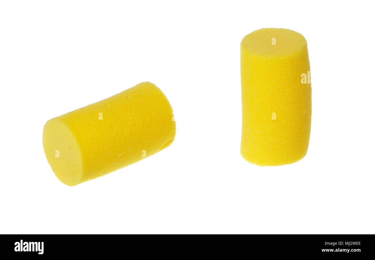 Two noise cancelling yellow foam ear plugs isolated on white background