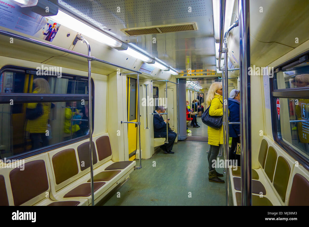 Metropolitan Inside MOSCOW, RUSSIA- APRIL, 29, 2018: People inside of metro, perspective ...
