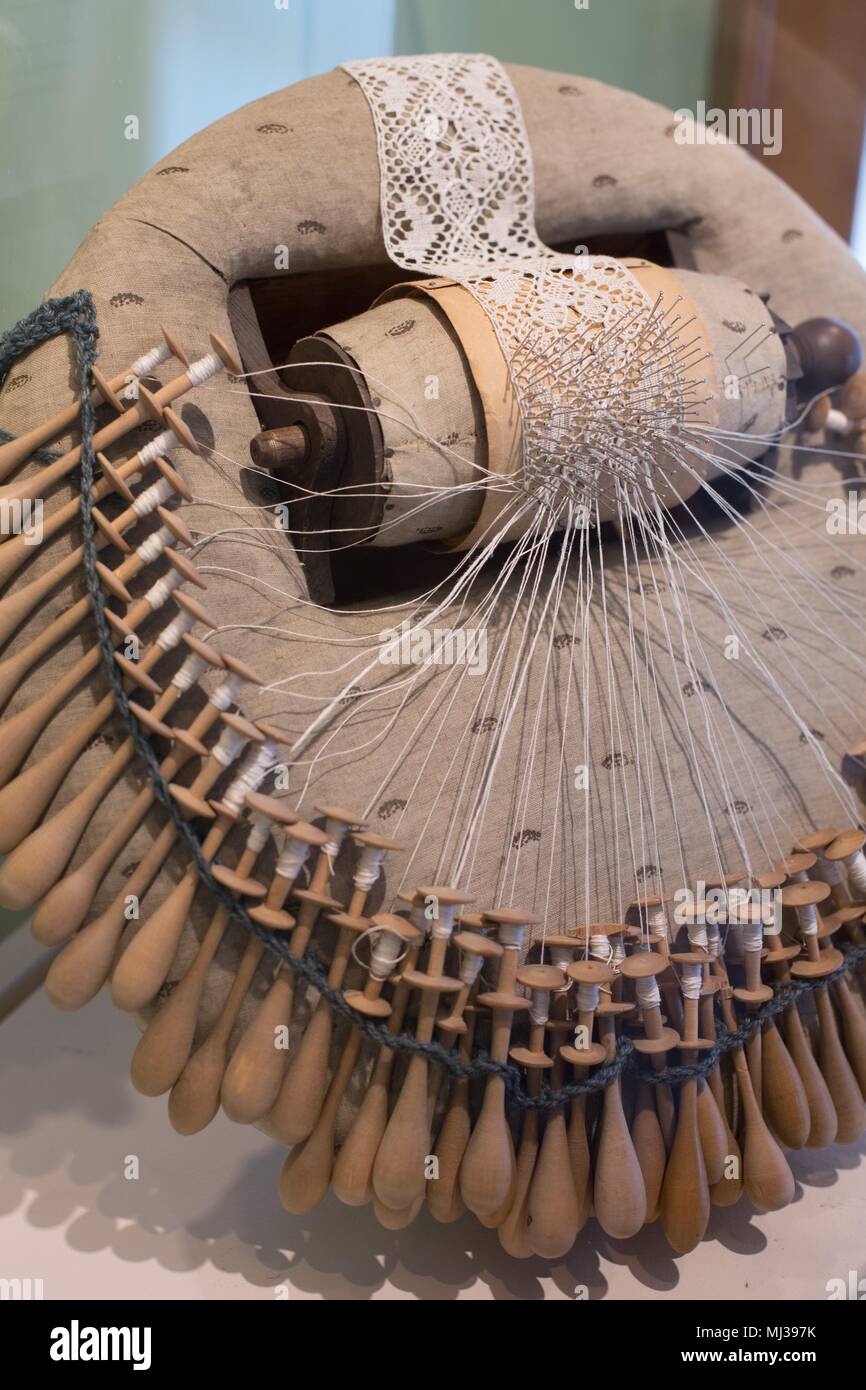 An antique bobbin lace pillow Stock Photo - Alamy