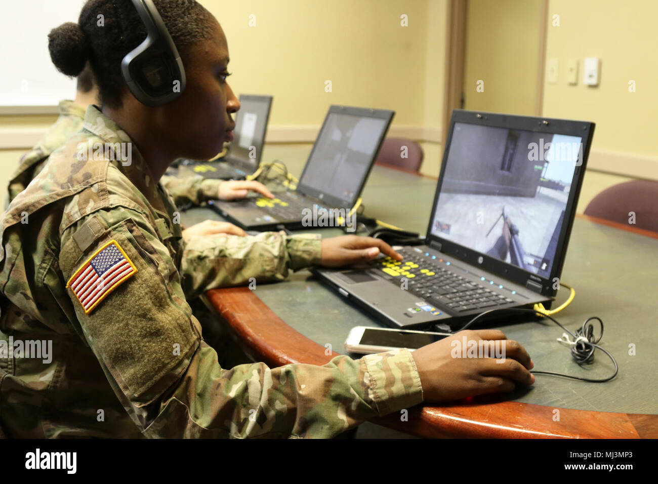 U.S. Army Pfc. Brion M. Eleazer of Lithonia, Ga., a human resources  specialist with the 642nd Regional Support Group, takes part in virtual  convoy training Feb. 24, at the unit headquarters in
