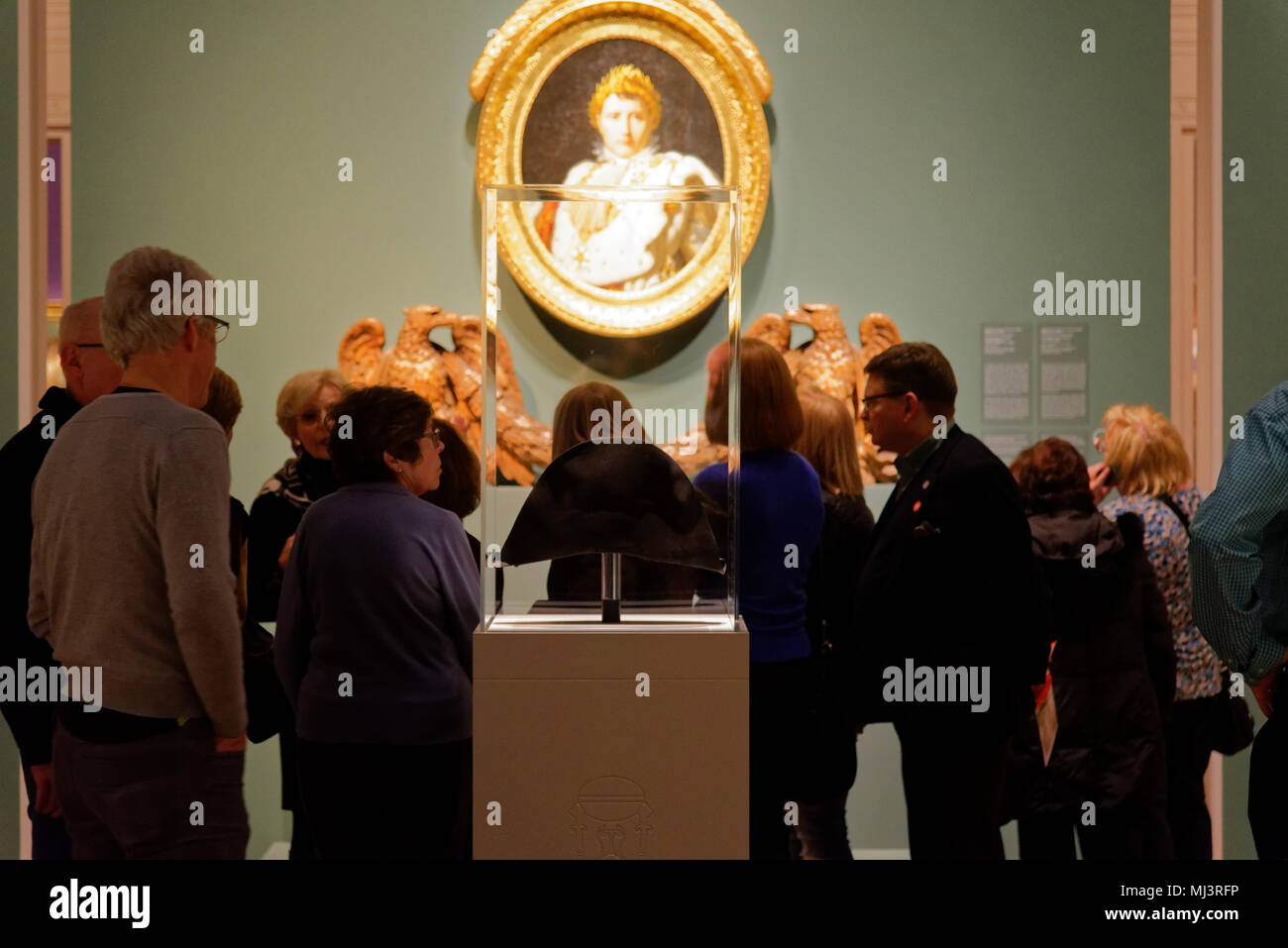 People looking at Napoleons two cornered hat in a display in Montreal Fine Art Museum Stock Photo