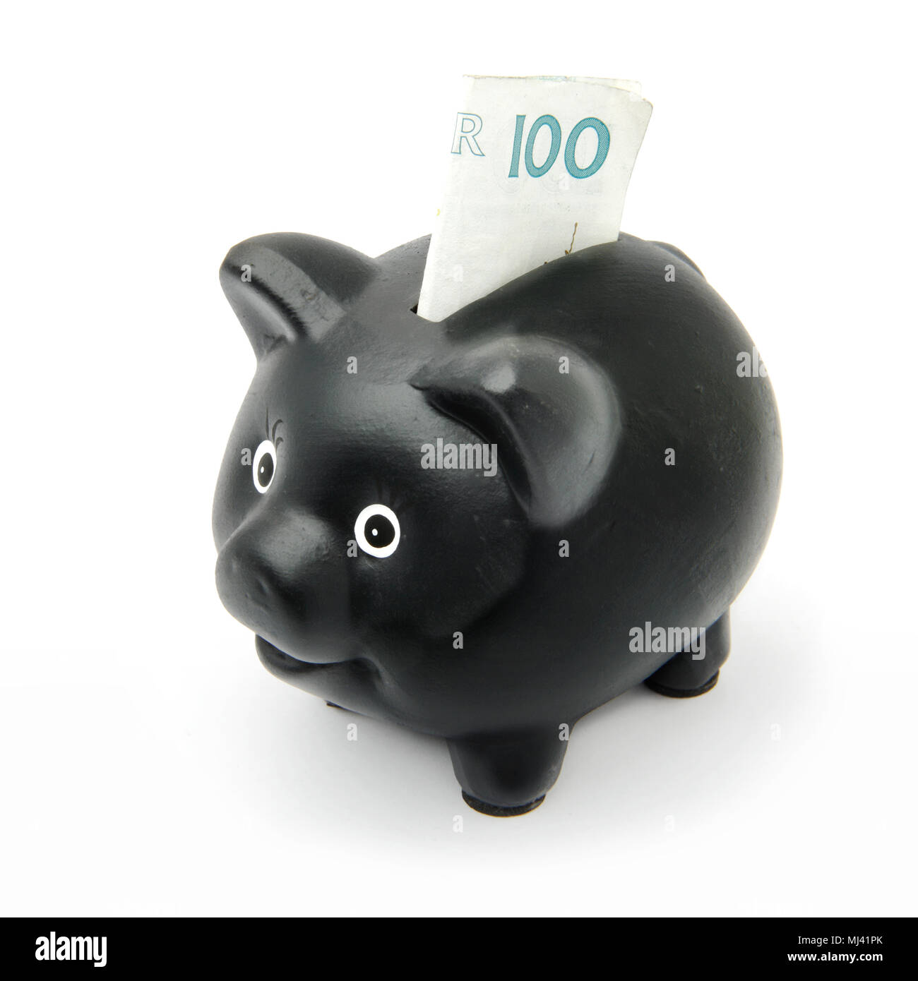 Black piggy bank isolated on white with a inserted 100 bank note. Stock Photo