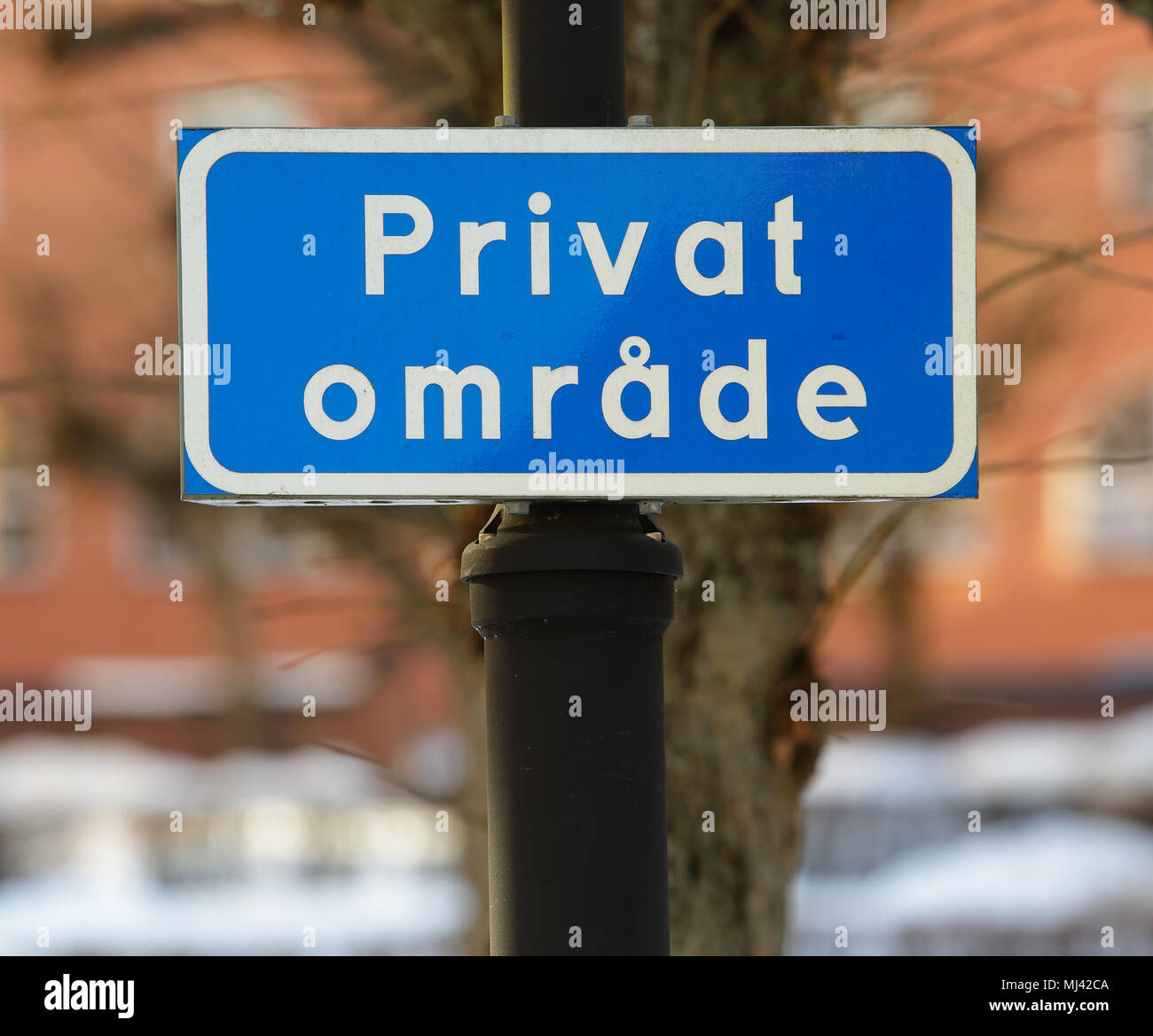 Sign with text in Swedish language with the message Private Area. Stock Photo