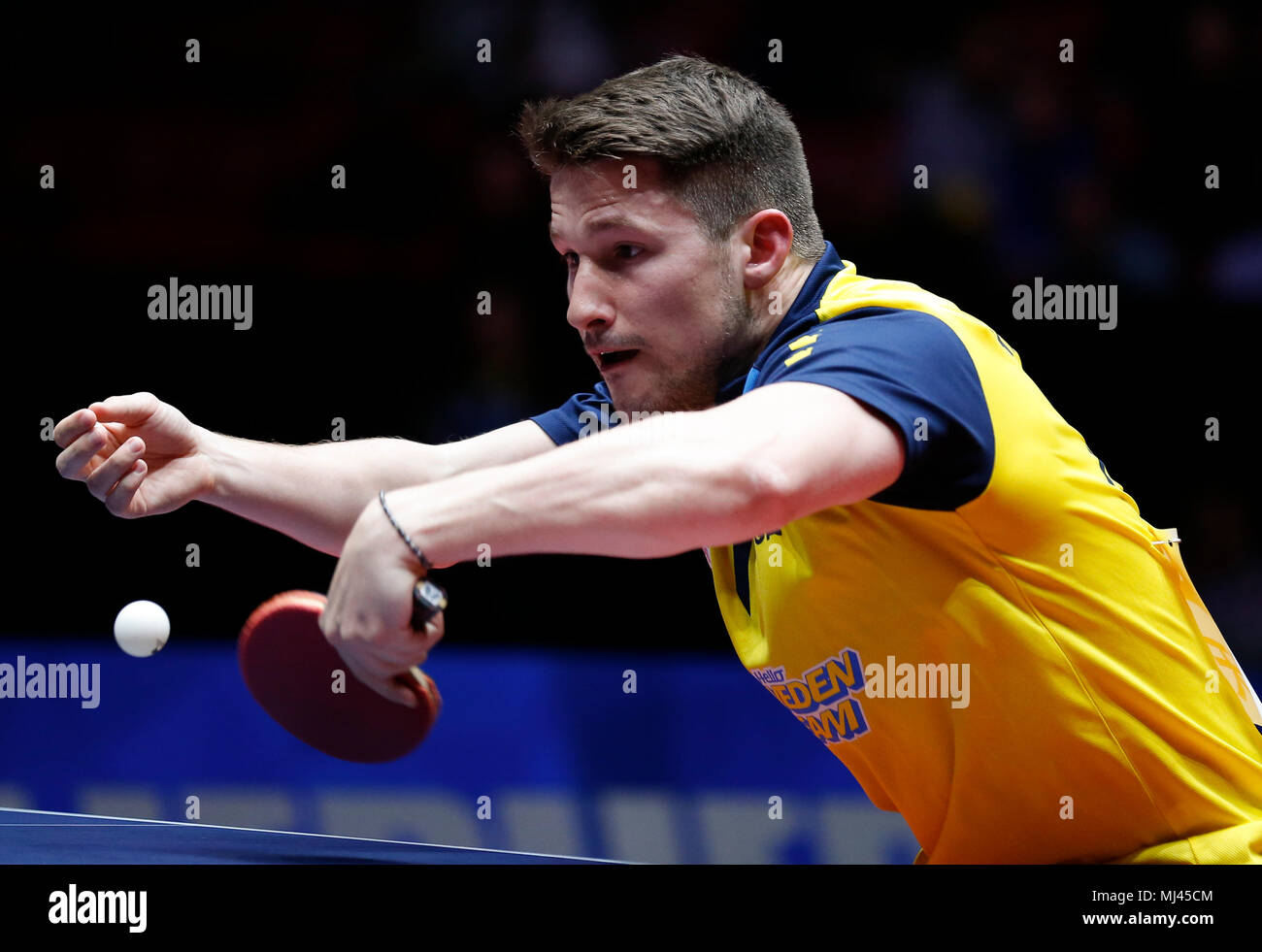 Halmstad, Sweden. 3rd May, 2018. Kristian Karlsson of Sweden competes  during the men's group round of 16 match against Chen Chien-An of Chinese  Taipei at the 2018 World Team Table Tennis Championships