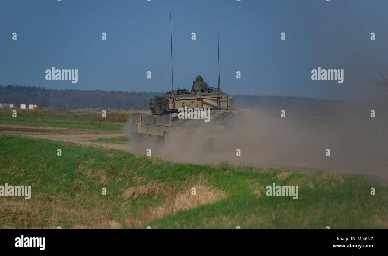 19 April 2018, Germany, Munster: A battle tank type 'Leopard 2 A7' stands on the military training area Munster. Photo: Philipp Schulze/dpa Stock Photo