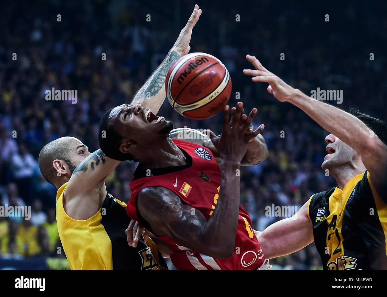 04 May 2018, Greece, Athens: Basketball, champions league, final four,  semi-final. AEK Athen vs UCAM Murcia. UCAM's Augusto Lima (C) in action.  Photo: Angelos Tzortzinis/dpa Stock Photo - Alamy
