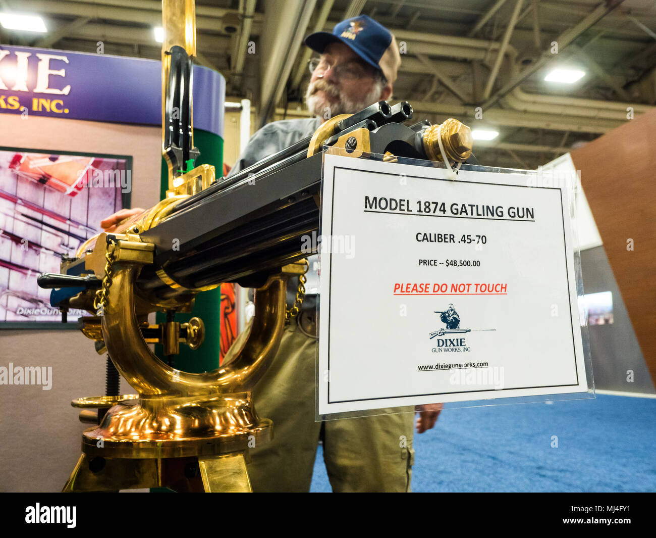 Dallas, USA. 4th May, 2018. Dallas, Texas, 04/05/2018 - Member of the National Rifle Association examines a replica of a Gatling Gun that existed in 1874. Specially priced at $48,500 USD Credit: J. G. Domke/Alamy Live News Stock Photo