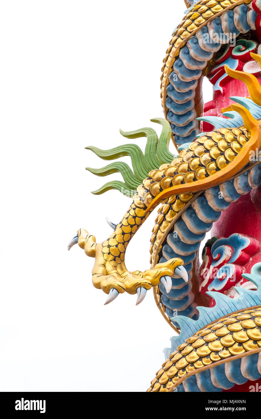 Golden dragon claw dragon foot statue on white background. Stock Photo