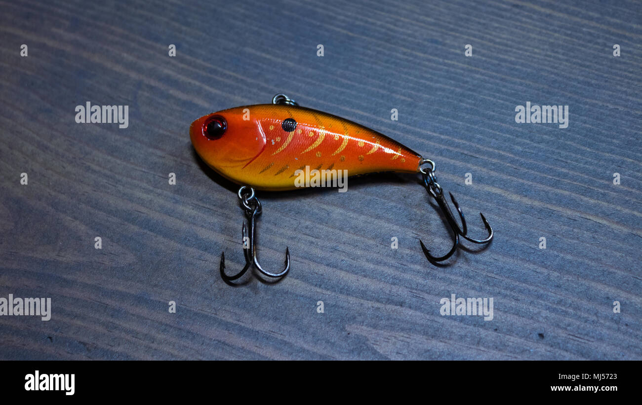 Lipless crankbait fishing lure with two treble hooks this lure is used to  mimic a small bait fish Colorado USA Stock Photo - Alamy
