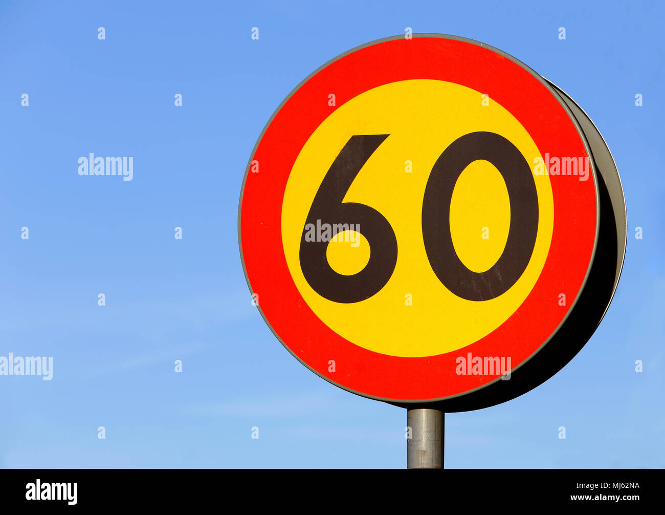 Swedish road sign speed limit 60 km/h. Stock Photo
