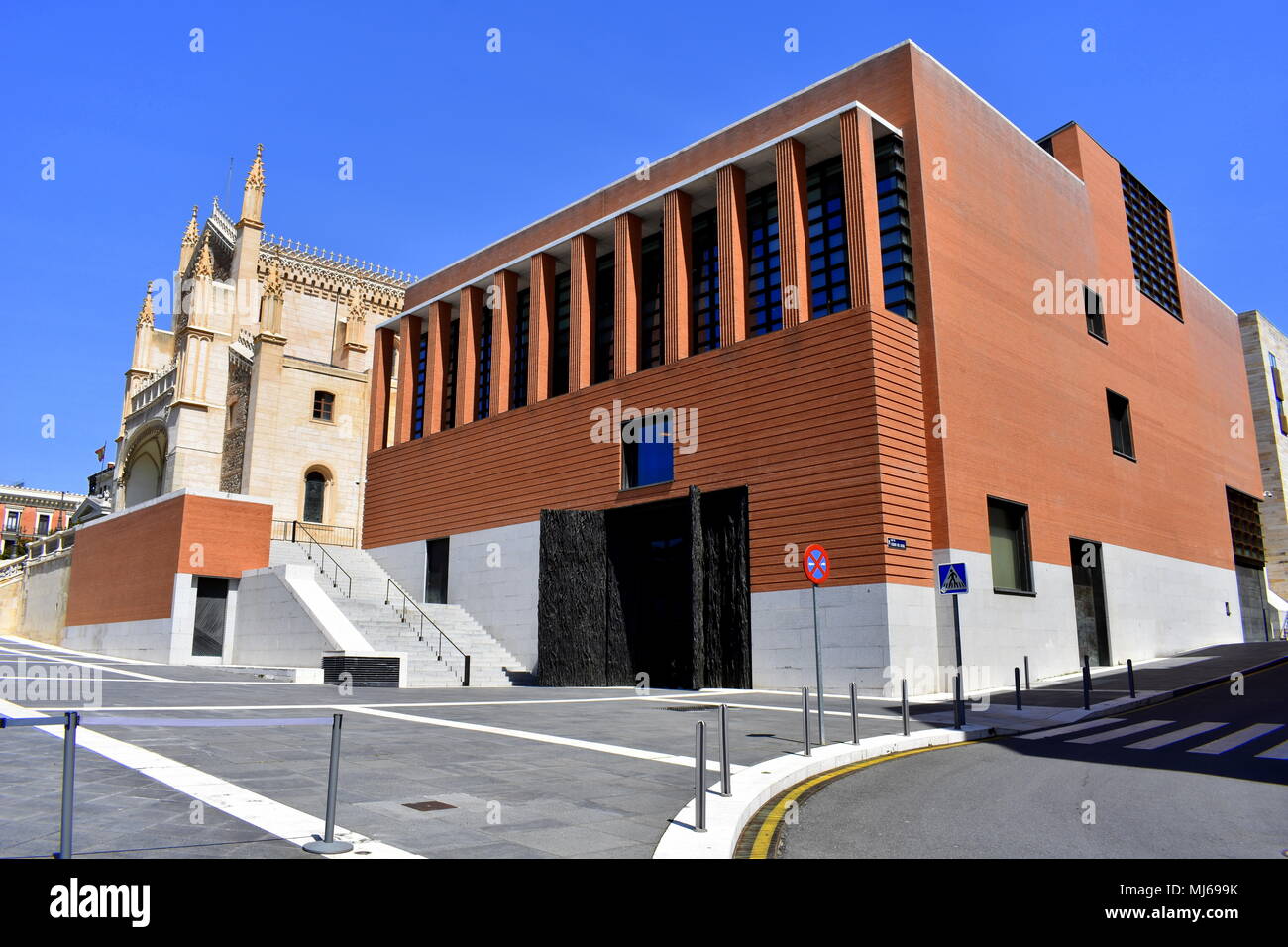 View of San Jerónimo el Real church and the Prado museum extension designed by Rafael Moneo with its monumental bronze doors, Madrid, Spain Stock Photo