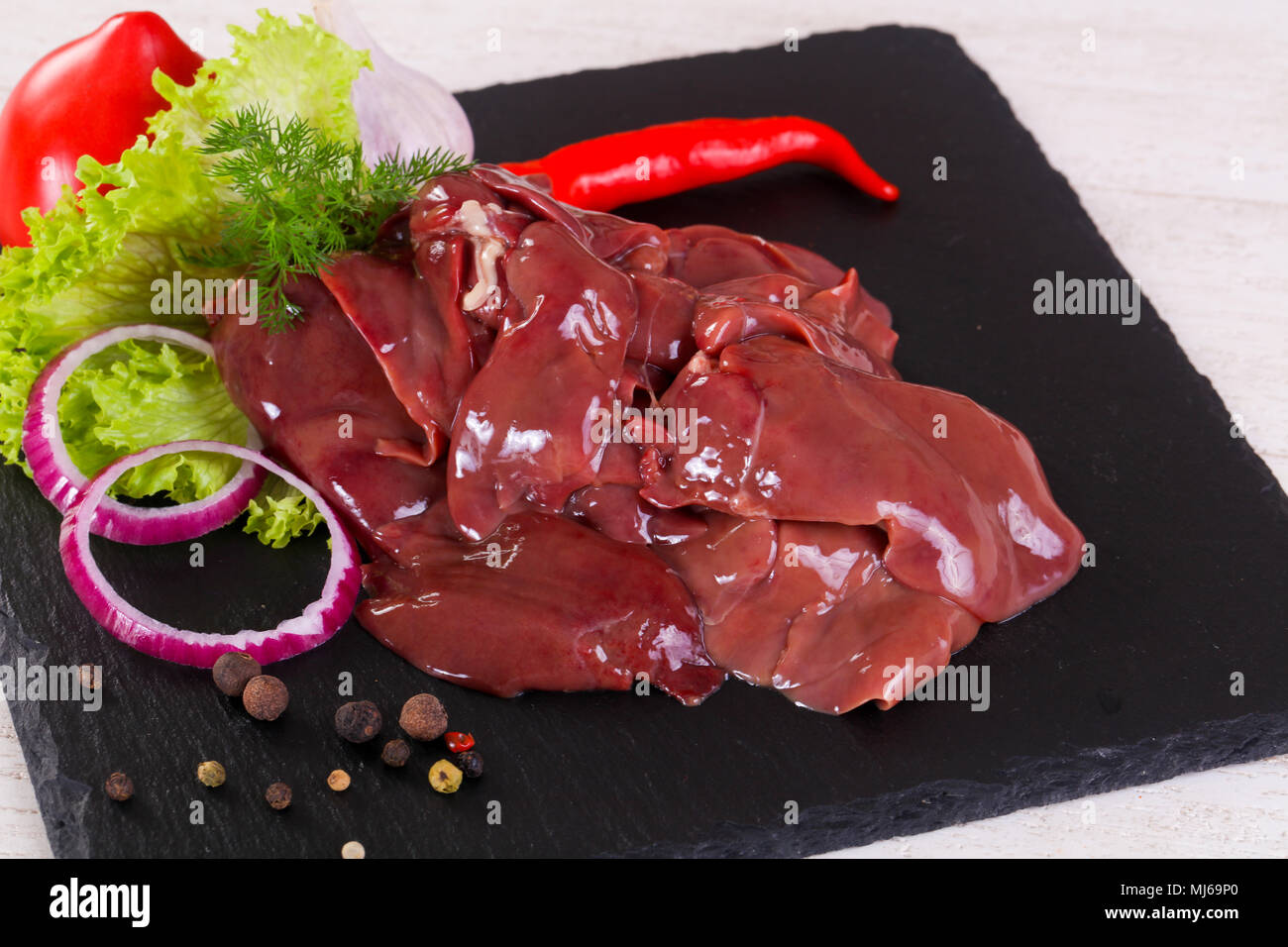 Raw chicken livers hi-res stock photography and images - Alamy