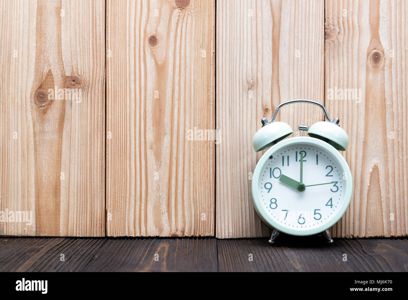 Retro vintage alarm clock on wood table, time concept idea Stock Photo ...