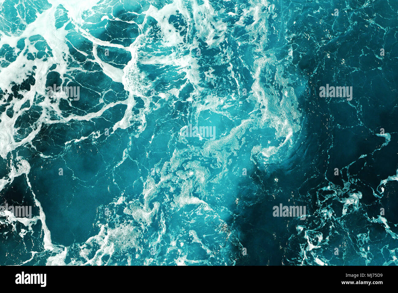 blue sea water texture, natural pattern of waves Stock Photo