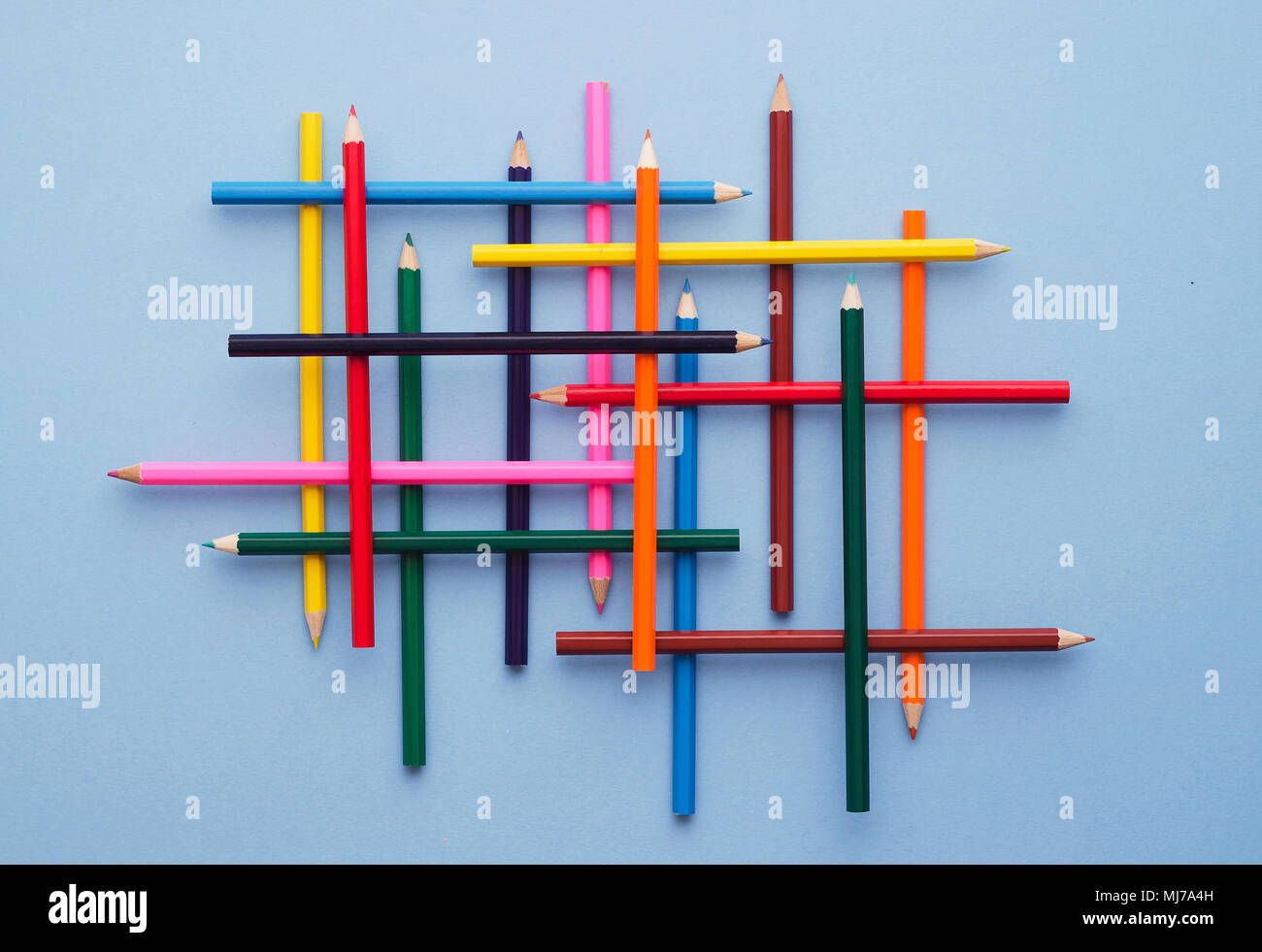 Collection of colorful crayons over blue background, above view Stock ...