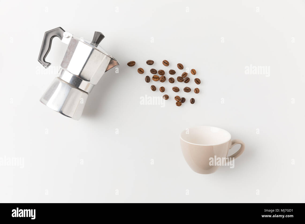 coffee beans pouring from pot Stock Photo
